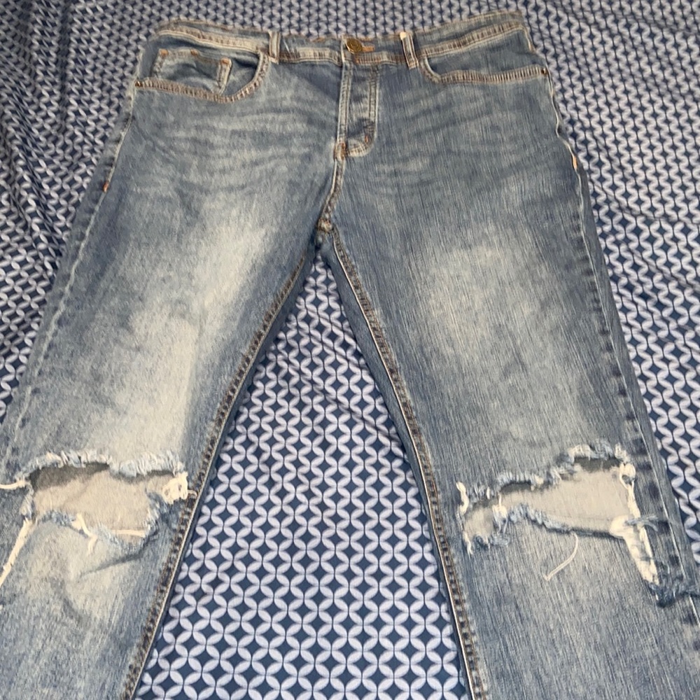 Grey and black denim jeans
